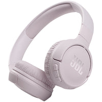 Wireless JBL TUNE 510BT headphones in pink with Bluetooth, Pure Bass sound, and integrated controls.
