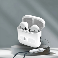 Wireless noise-cancelling EchoBuds with charging case on a pedestal.